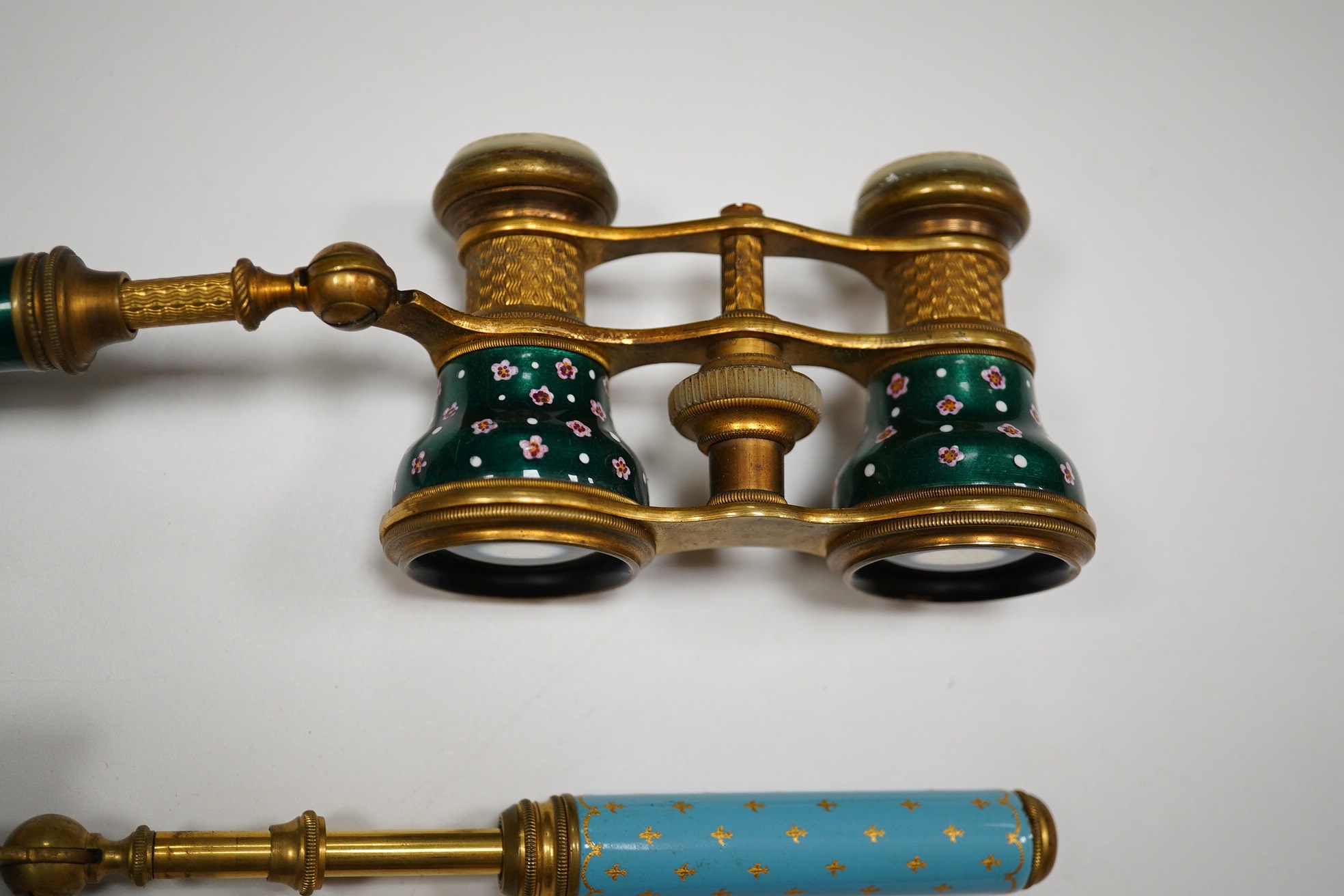 Two 19th century French enamelled opera glasses. Condition - fair